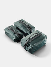 Three juniper gear cubes with zippers on a white background