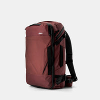 3/4 view of garnet globerider35 on light gray background