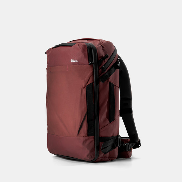 3/4 view of garnet globerider35 on light gray background