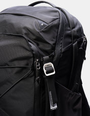 Close-up of a black bag with a strap featuring the Matador logo.