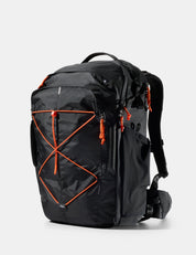 Black backpack with orange accents on a white background