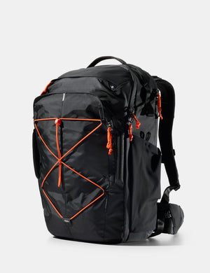 Black backpack with orange accents on a white background