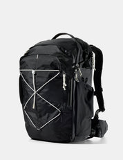 Black backpack with white accents on a light gray background