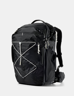 Black backpack with white accents on a light gray background
