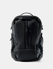 Black backpack on a light gray background