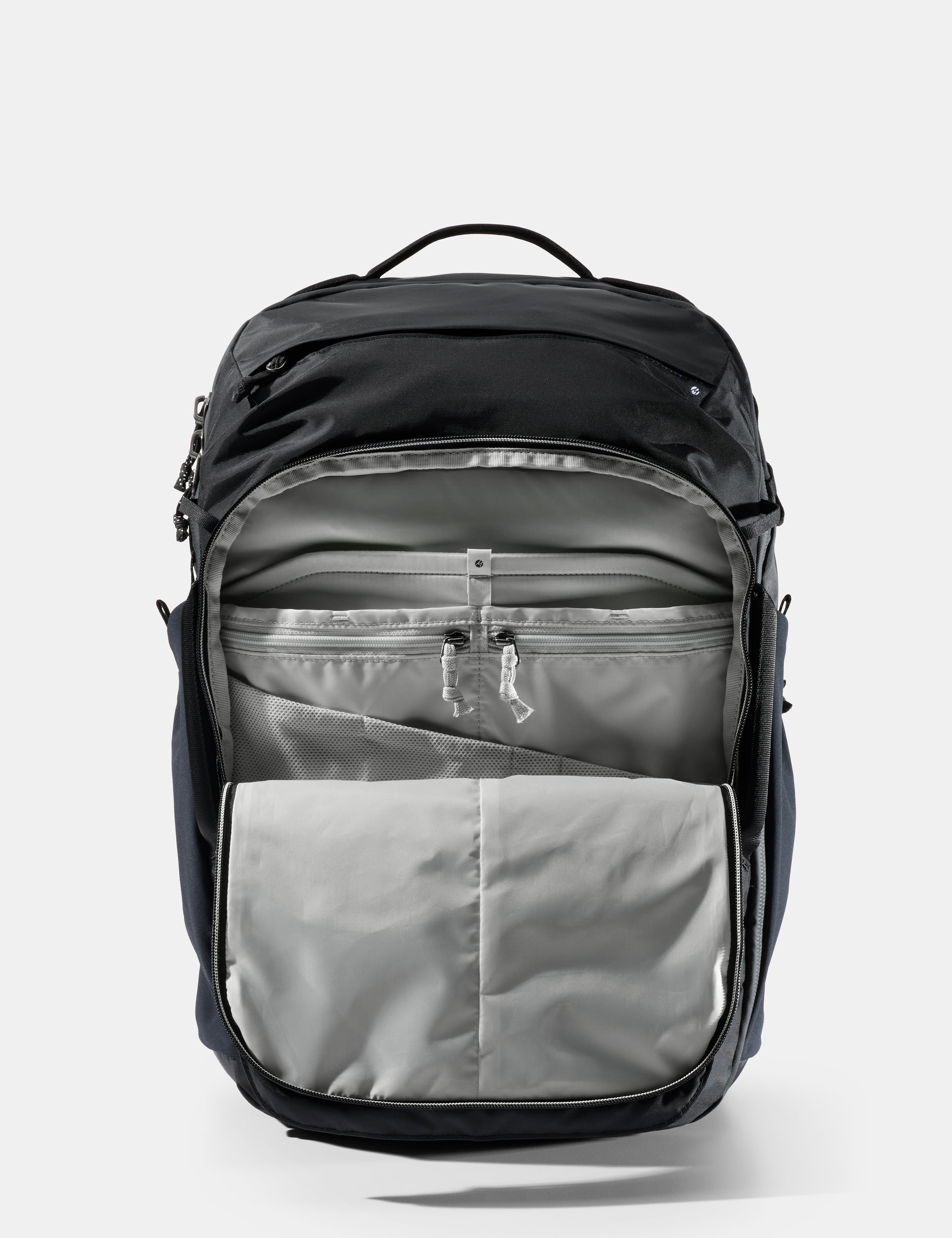 Black and gray backpack on a light gray background
