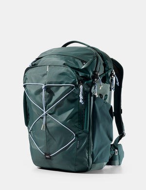 Green backpack on a white background