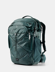 Green backpack on a white background