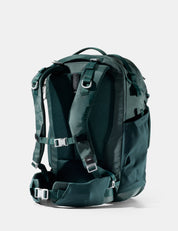 Green backpack on a white background