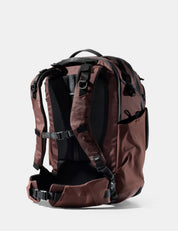 garnet backpack with black straps on a white background