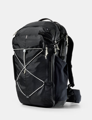black bag with white cord and pullers