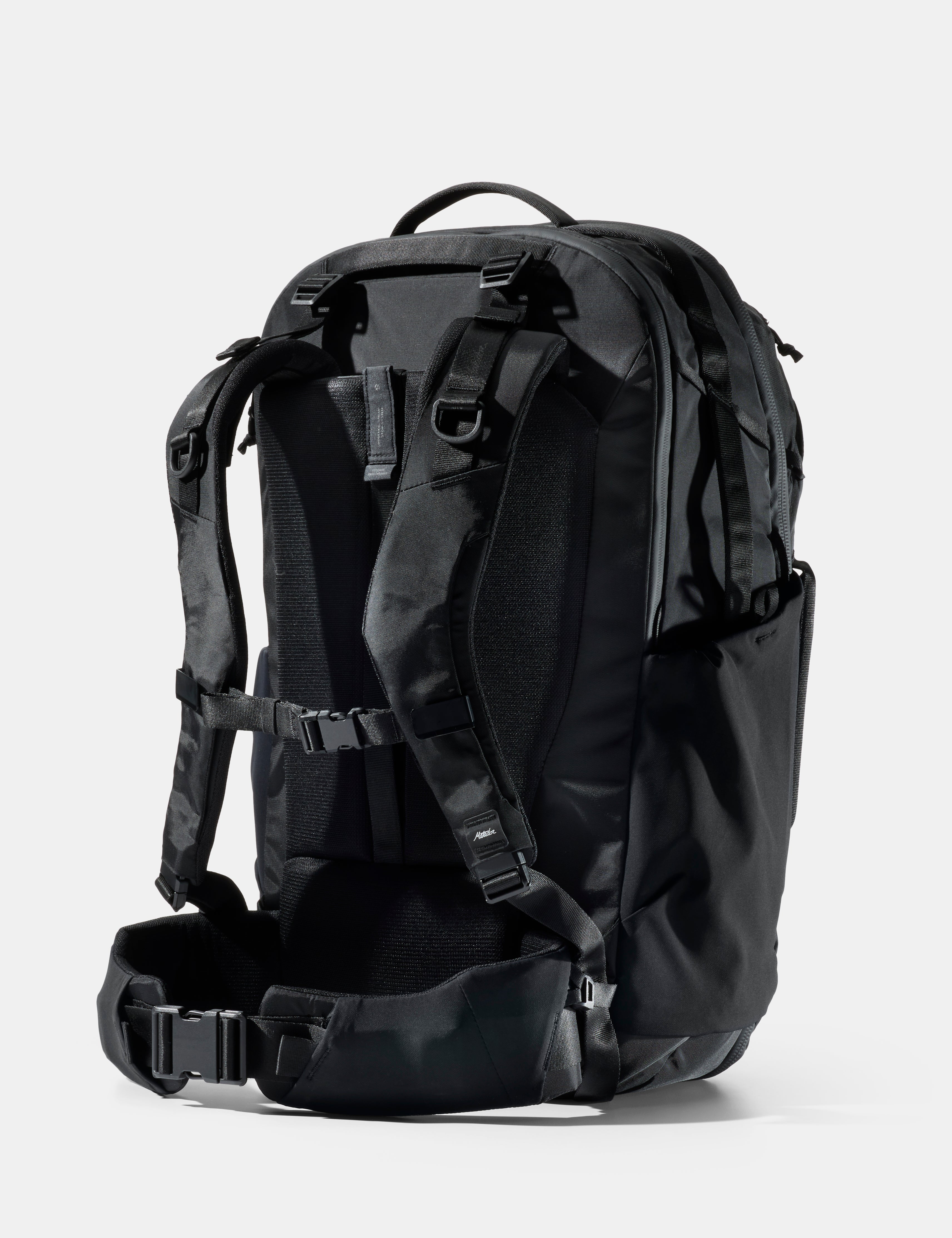 Black backpack on a white background