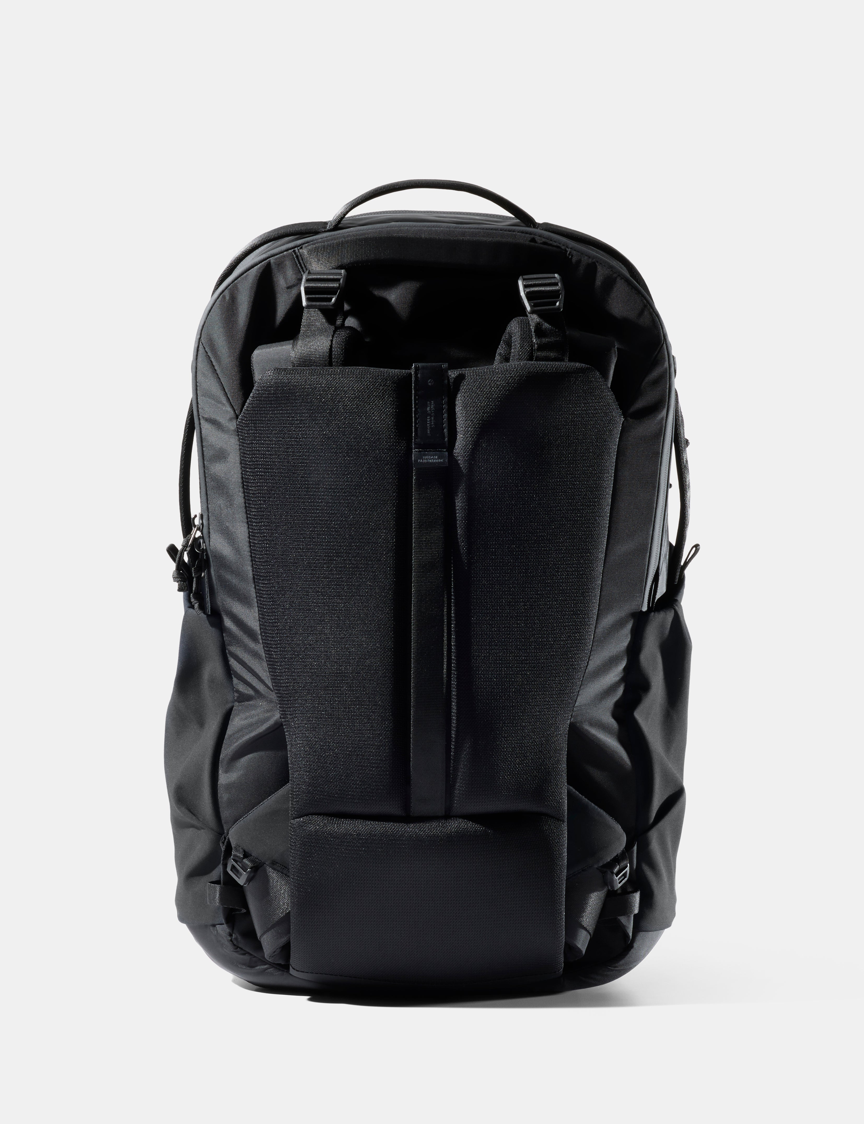 Black backpack on a white background