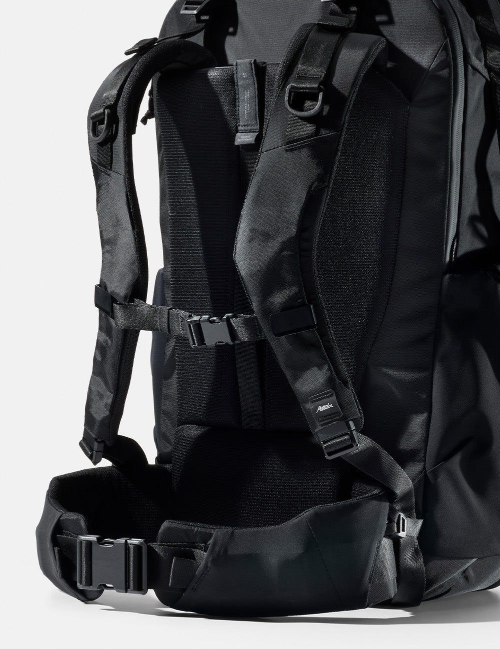 straps and hipbelt of black backpack