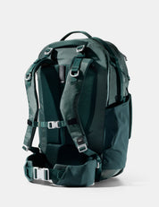 Green backpack on a white background