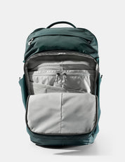 Green and gray backpack on a white background
