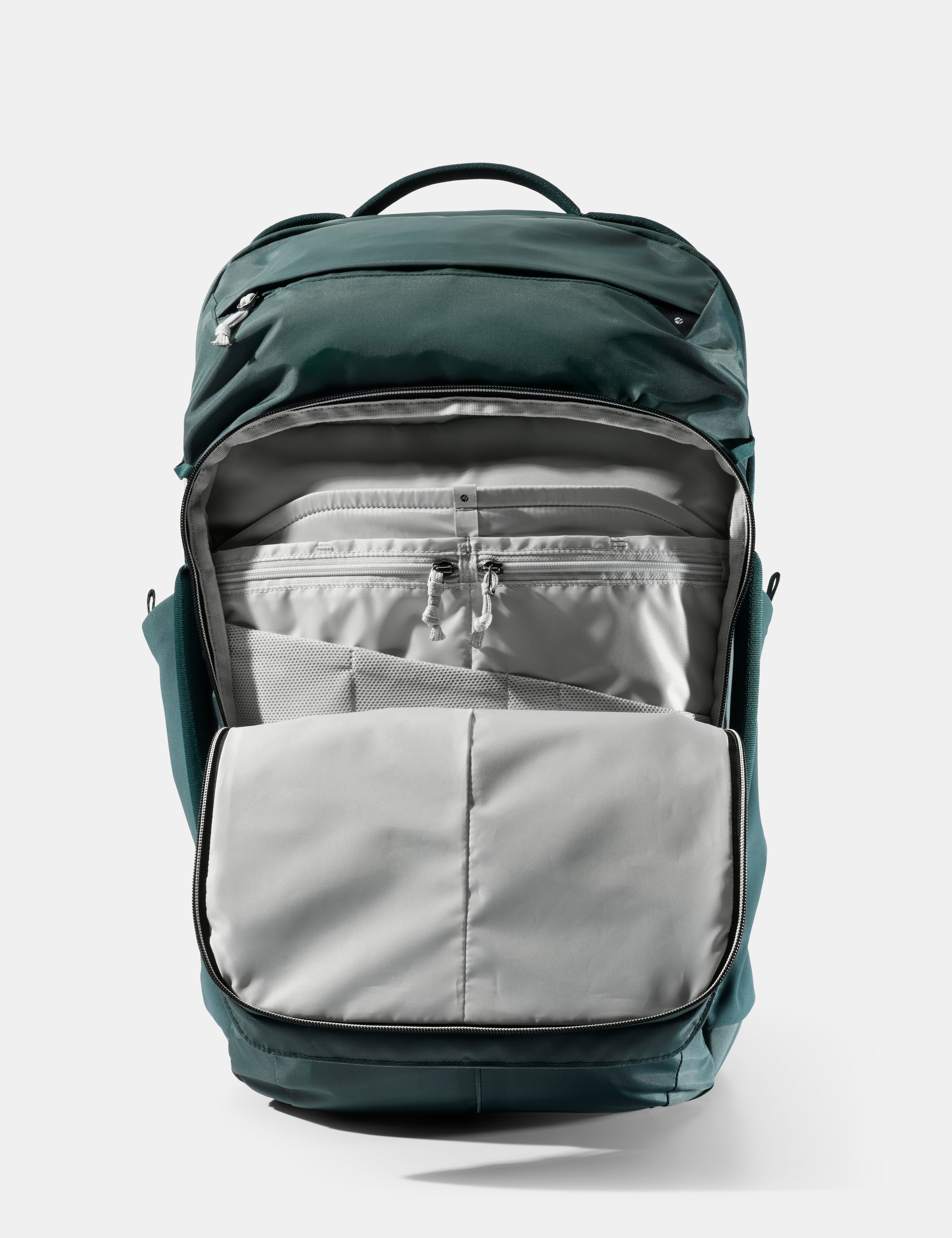 Green and gray backpack on a white background