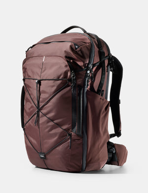 garnet backpack with black straps on a white background