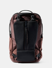 garnet and black backpack on a white background