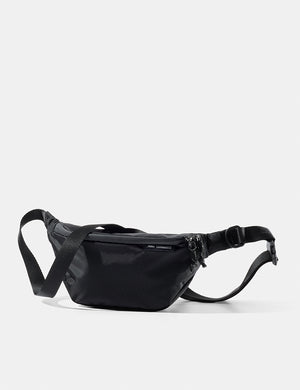 Black waist bag on a white background
