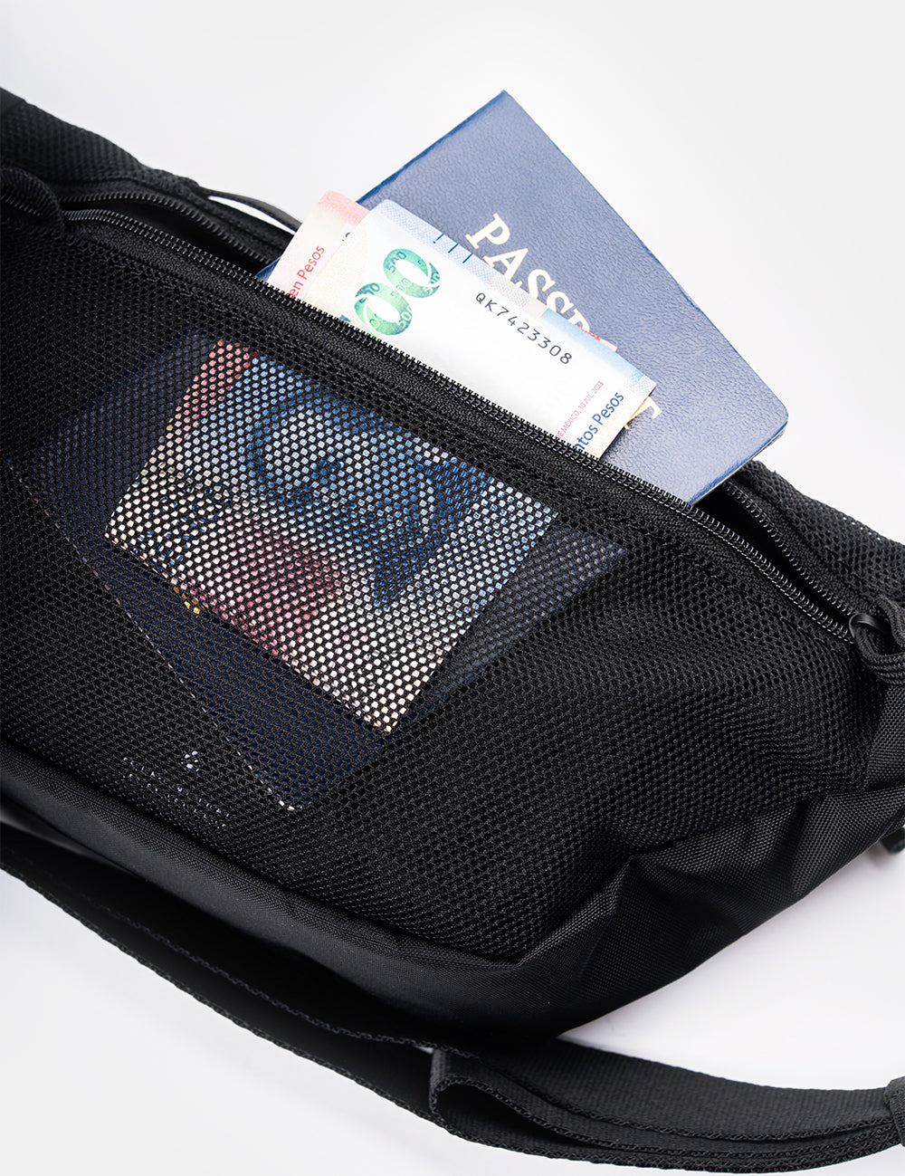 passport and money coming out of sling zipper pocket