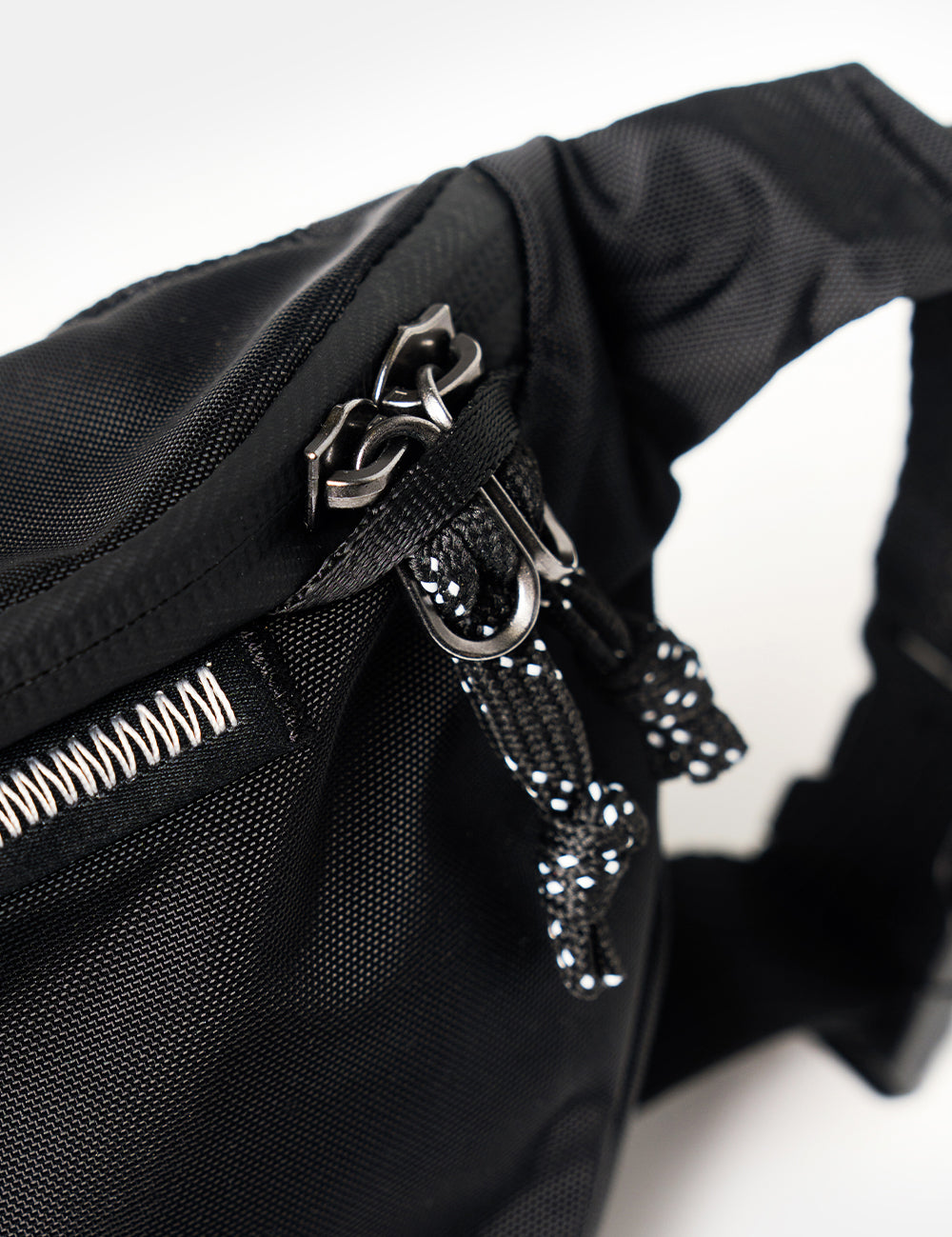 close up view of zipper security loops
