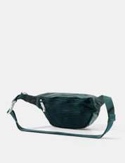 Green waist bag on a white background