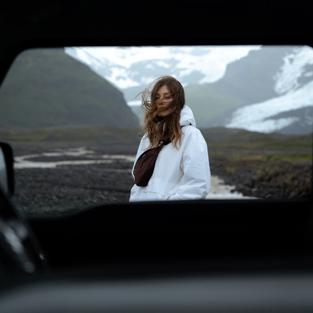 person in iceland landscape with garnet sling