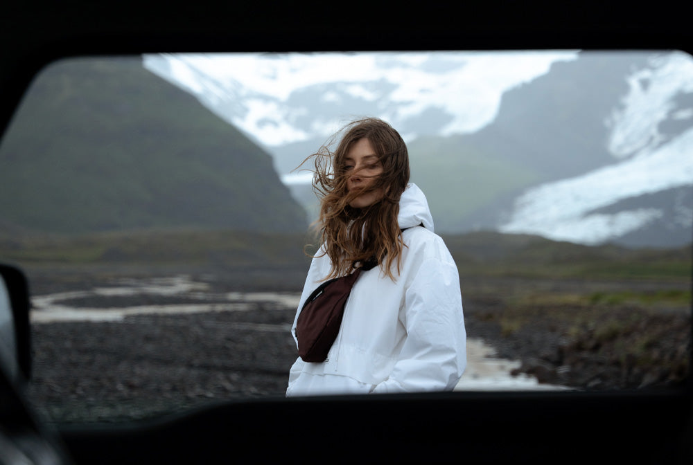 person in iceland landscape with garnet sling