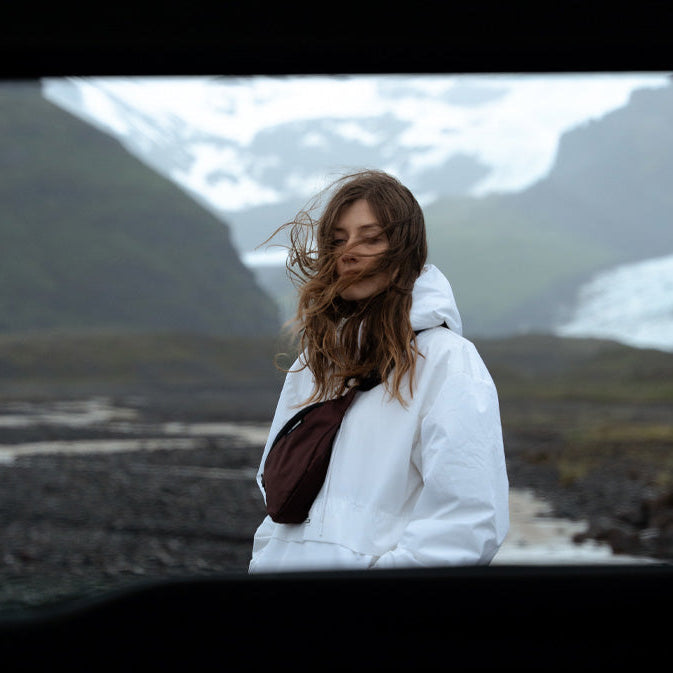 person in iceland landscape with garnet sling
