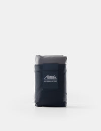 black pocket blanket on white background
