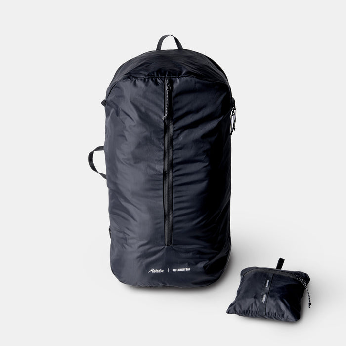 Full sized and Packed up packable laundry bag  on light gray background