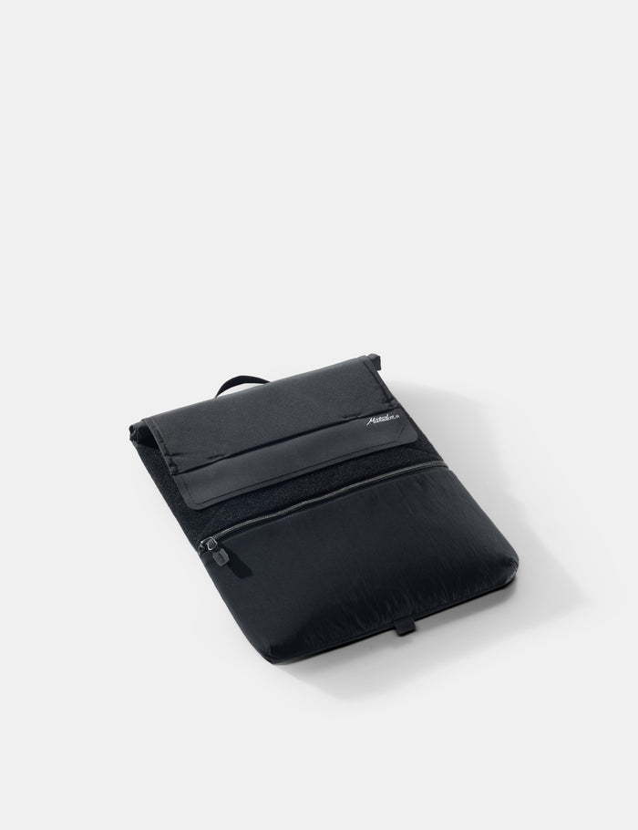 Black laptop base layer on a white background