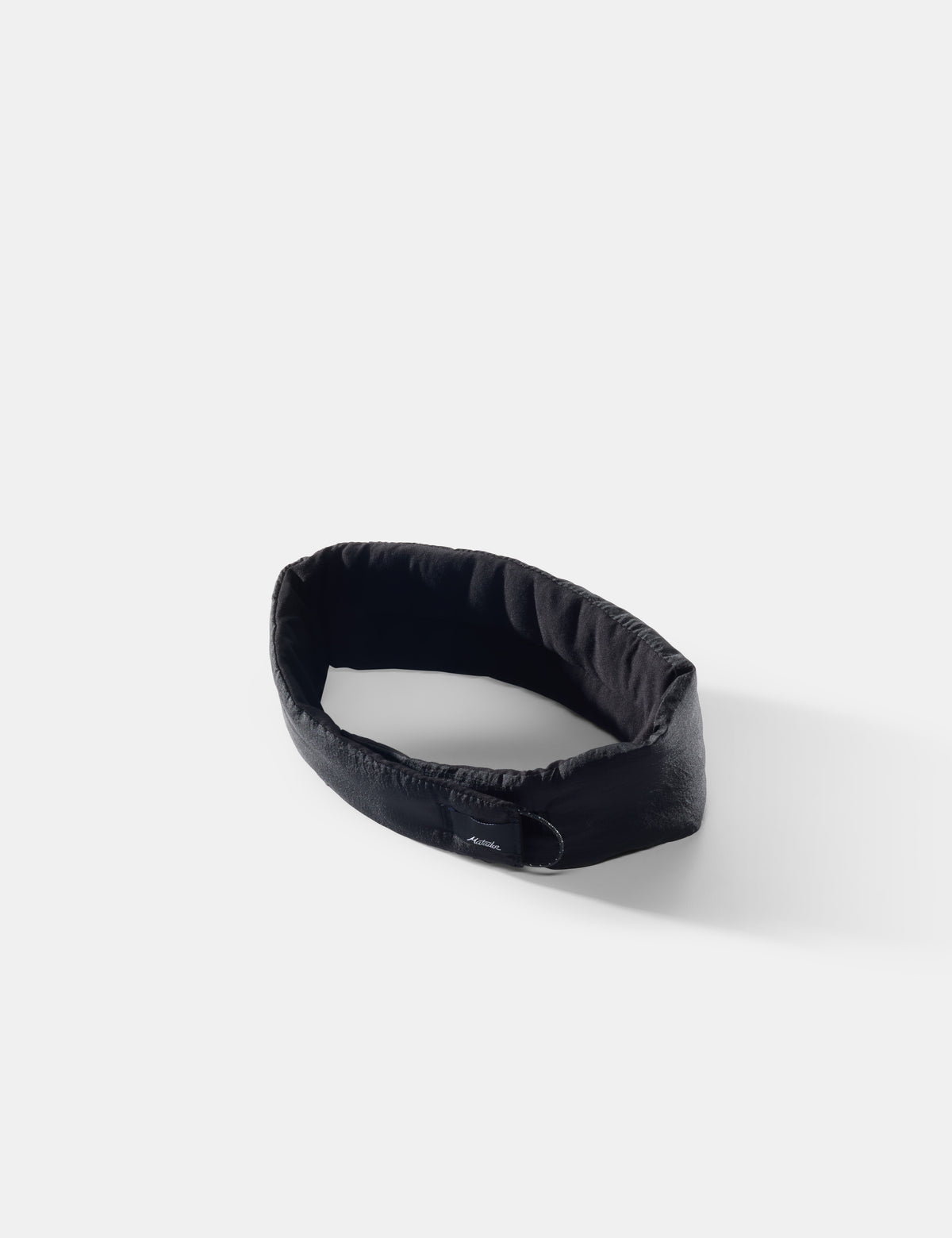 Black sleepmask 
on a white background
