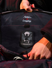 black raven patch inside backpack