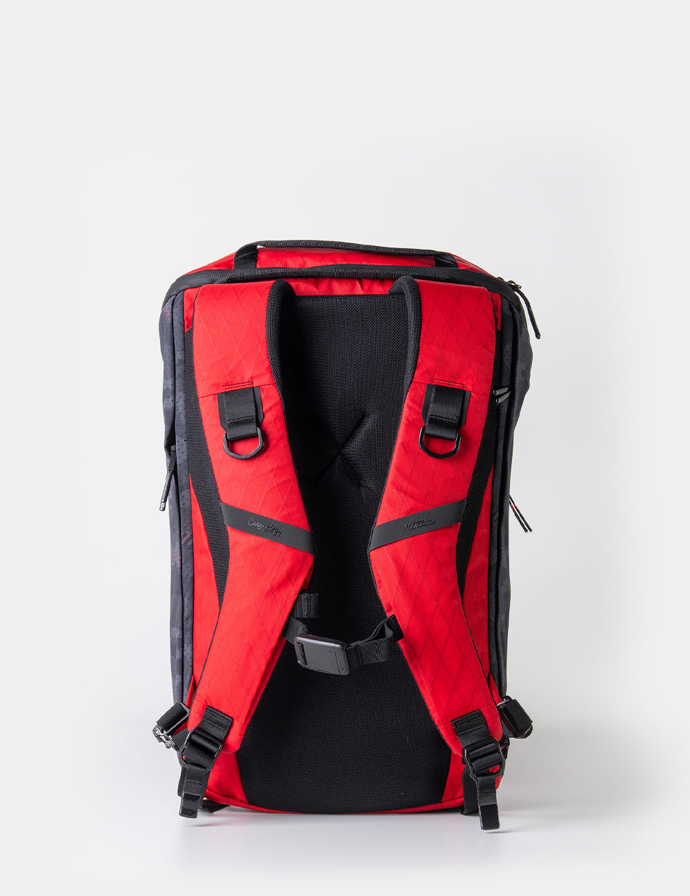 red backpack straps on white background