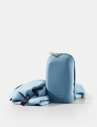 Blue towel and case  on a white background