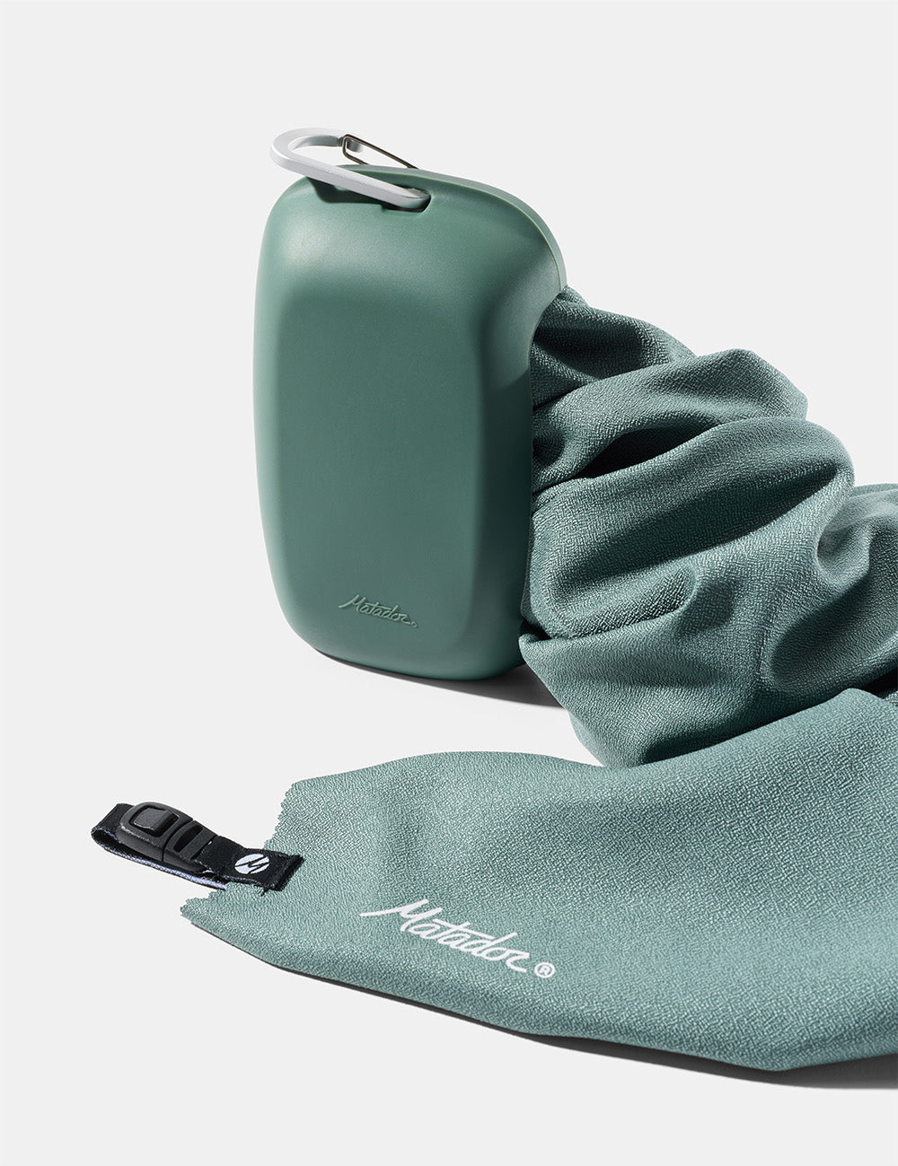 green silicone case with green towel coming out