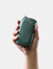 hand holding green silicone case on white
