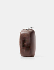 silicone case with orange speckles on white background