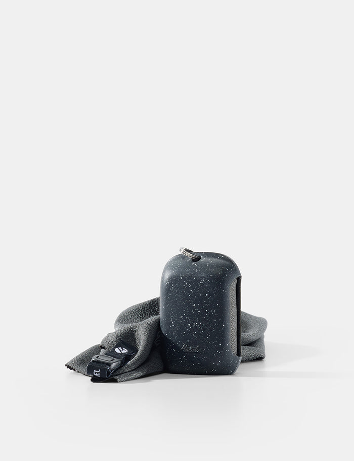Black speckled towel and case