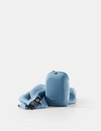 Blue towel case and towel on white background