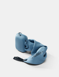 Blue towel case and towel on a white background