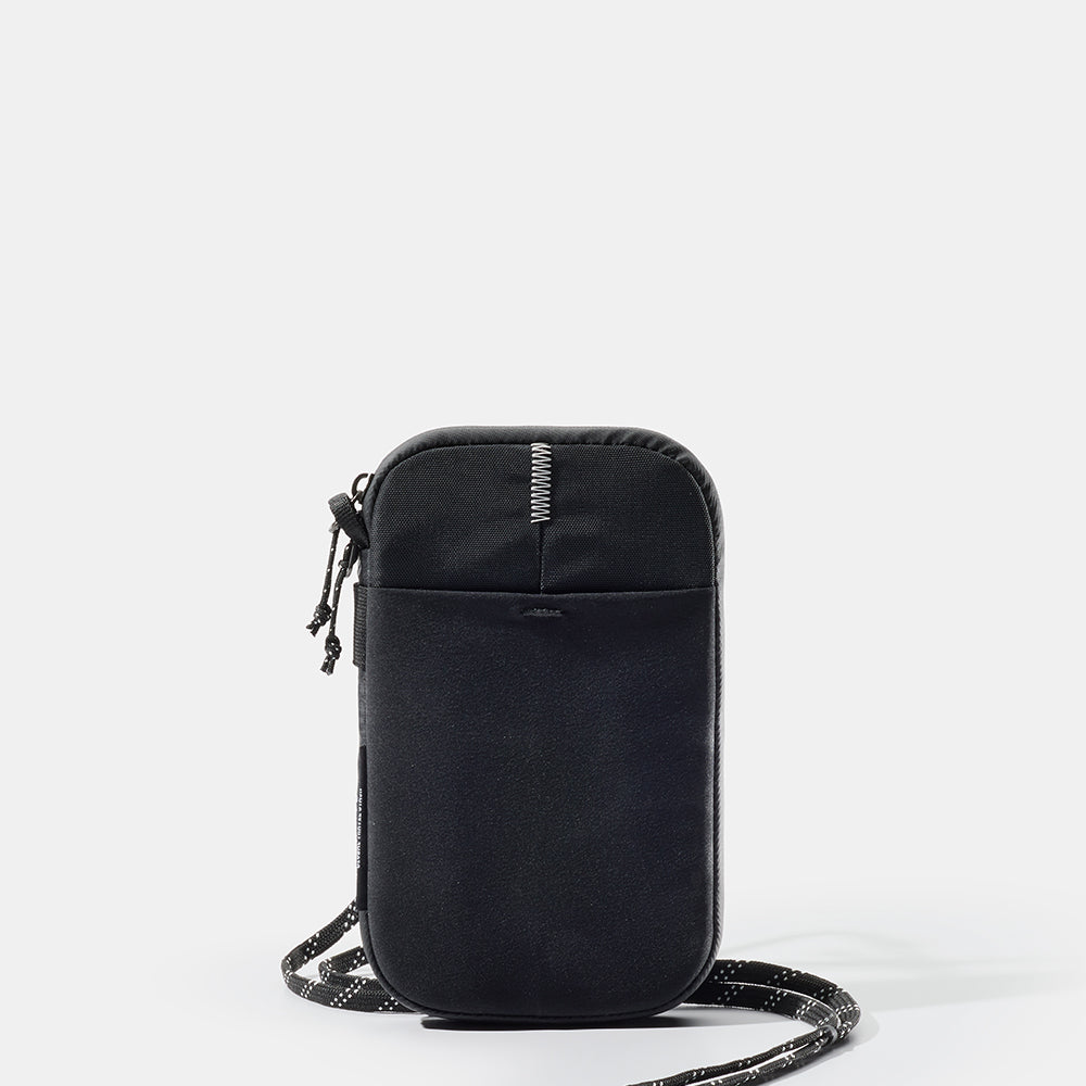 Black travel wallet on white background