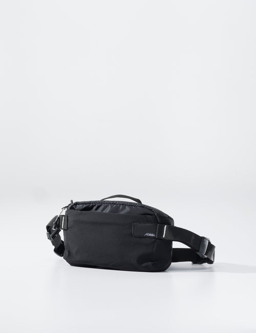 Black waist bag on a light gray background