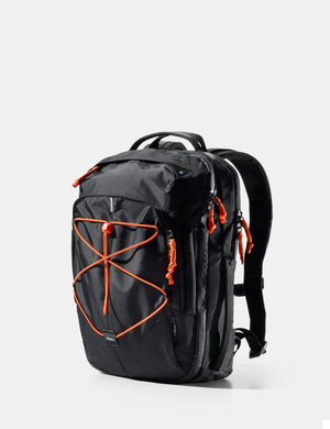 Black backpack with orange accents on a white background