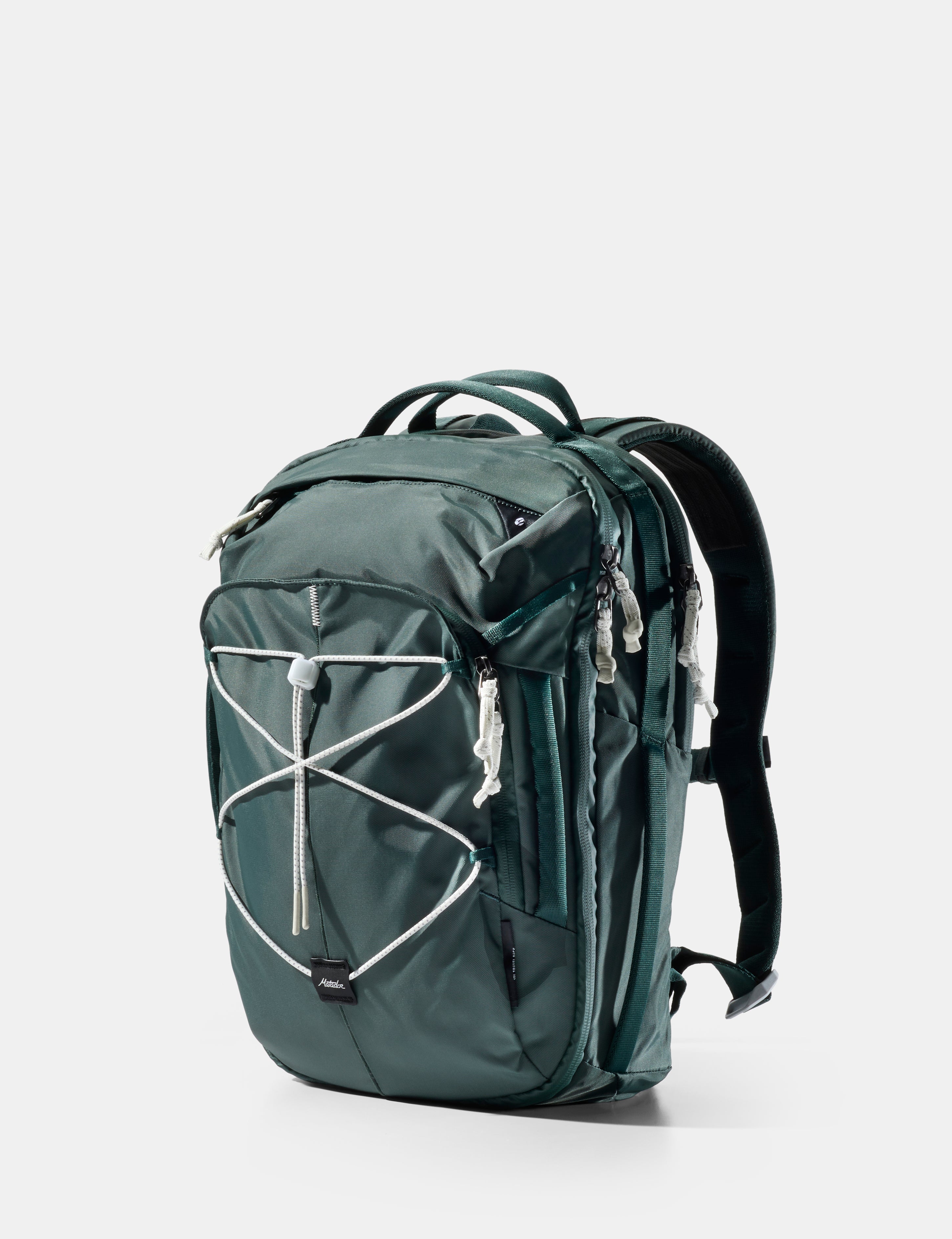 Green backpack with white accents on a light gray background