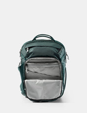 Green backpack with gray interior on a white background