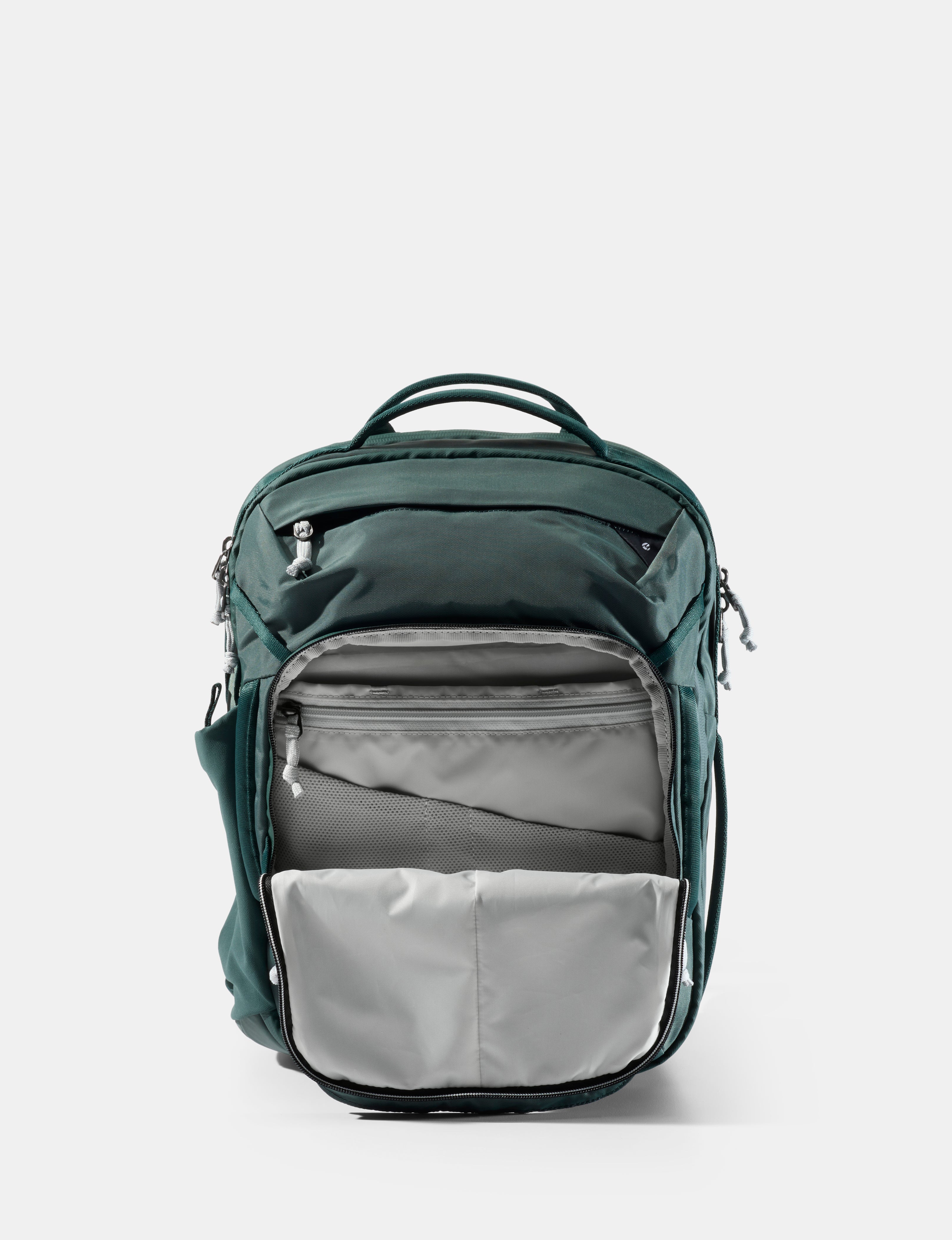 Green backpack with gray interior on a white background