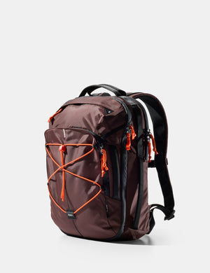 garnet backpack with orange accents on a white background